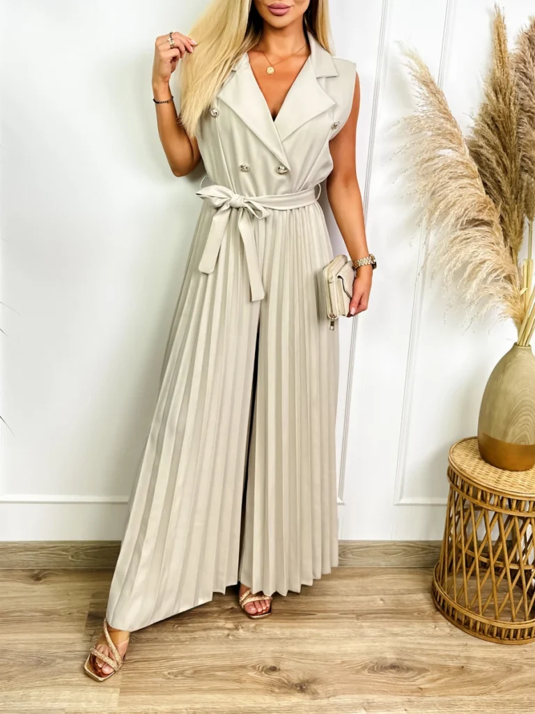 Elegancki beżowy kombinezon damski z plisowanymi nogawkami – Skyline widok z przodu